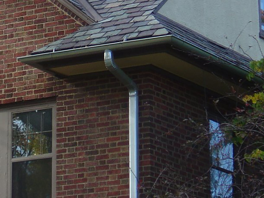 Gutter on Brick home with Slate Roof