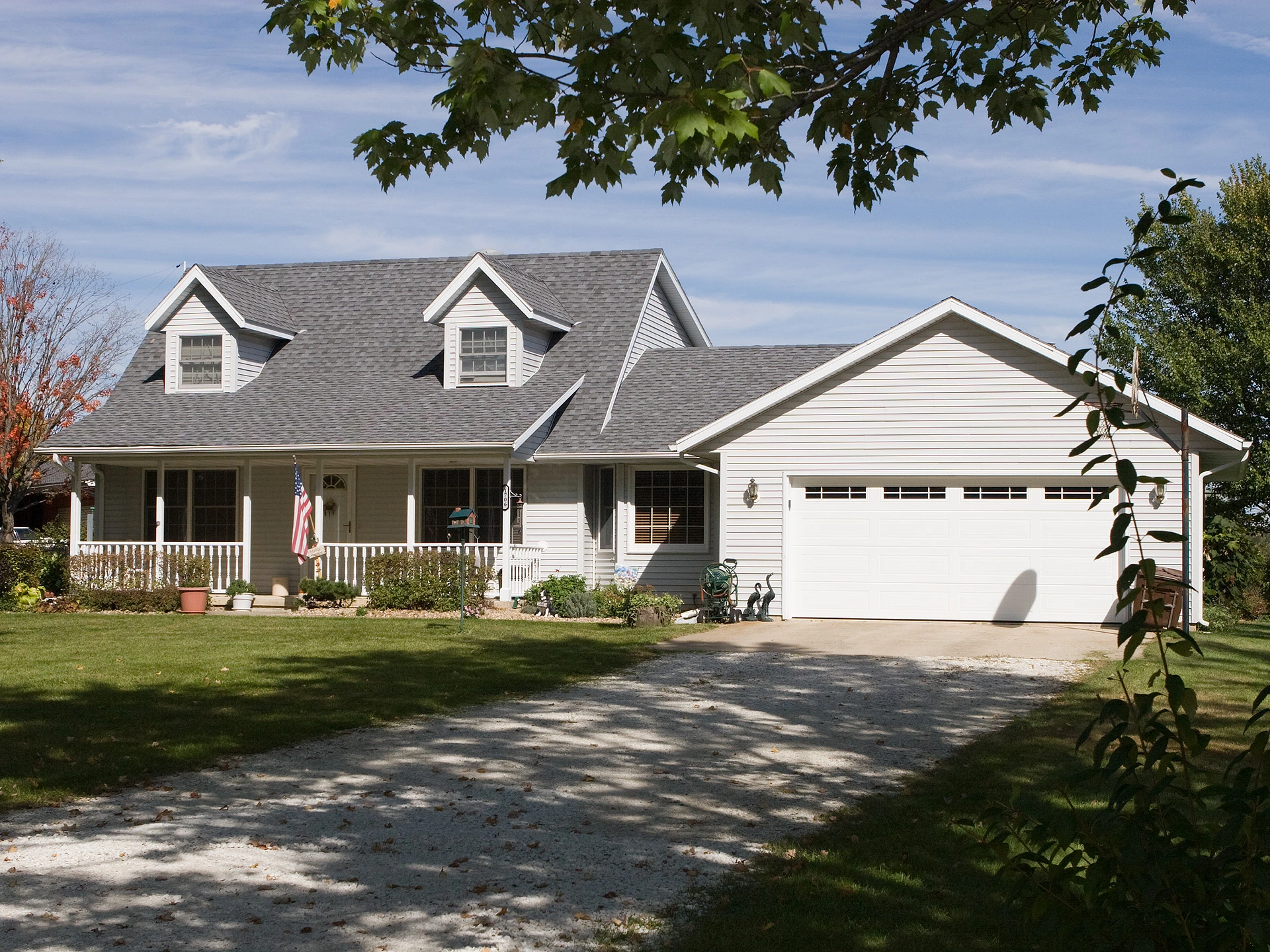 grey shingle roof attached garage in Champaign, Il with recent roof repairs