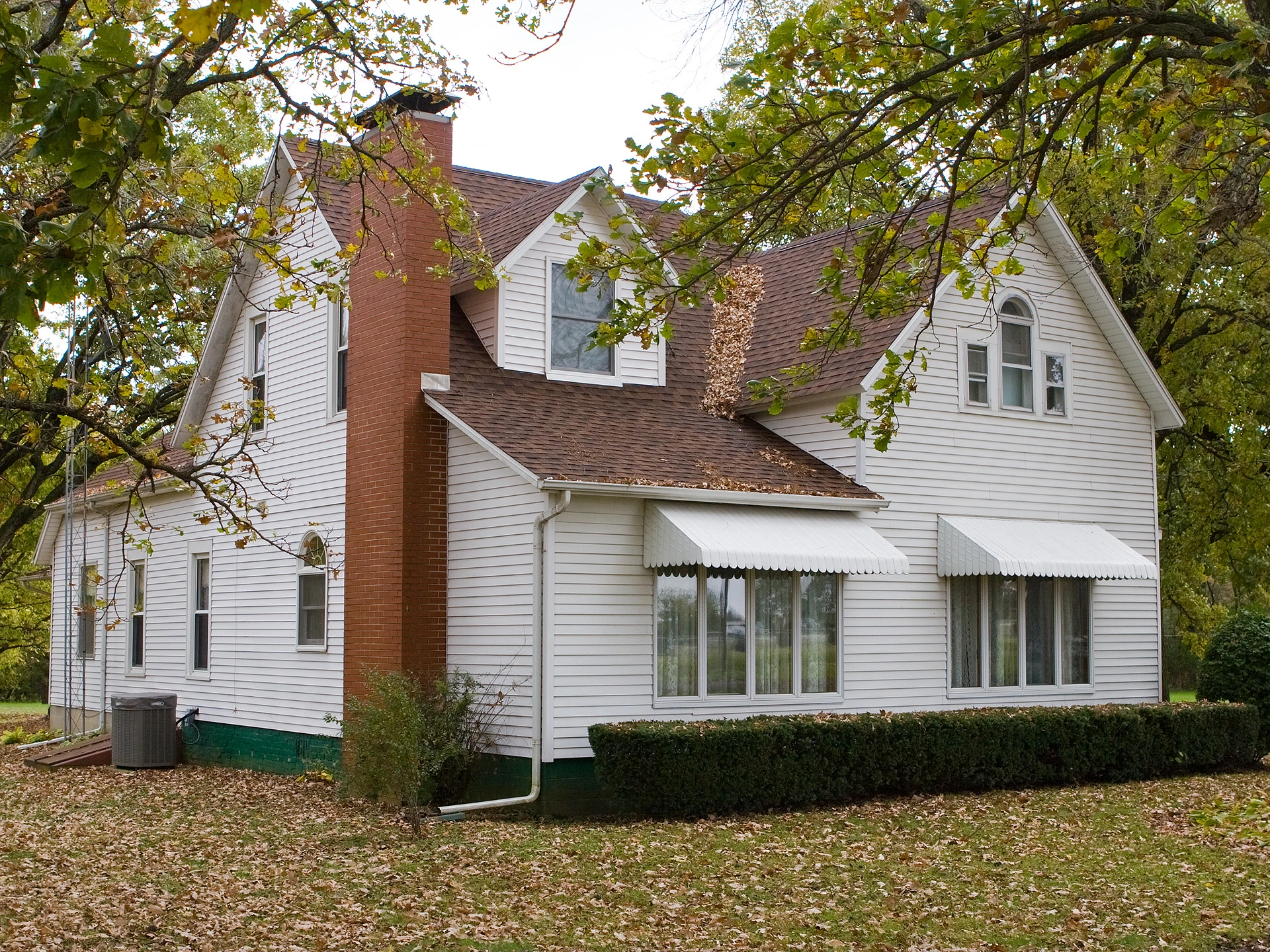 New Shingle Roof On White Farm House in Champaign 